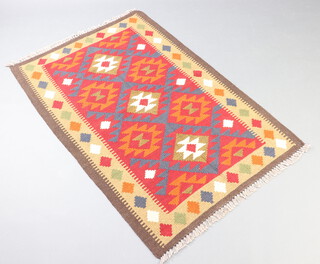 A red, tan and white ground Maimana Kilim rug 157cm x 106cm  