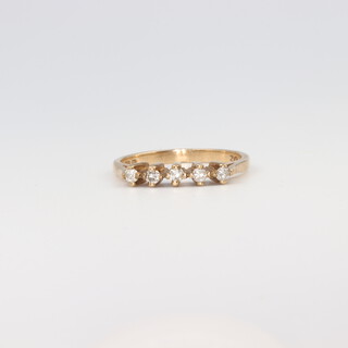 A 9ct yellow gold 5 stone diamond ring 1.8 grams, size K 1/2 