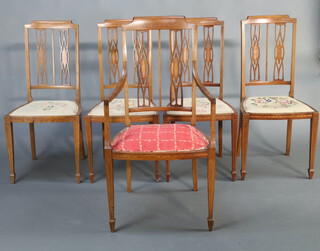 A set of 5 Edwardian inlaid mahogany stick and rail back dining chairs, raised on square tapered supports, spade feet comprising 1 carver 101cm h x 53cm w x 48cm d (31cm x 30cm) and 4 standard 95cm h x 45cm x 42cm (seat 29cm x 29cm) 