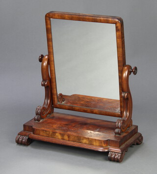 A Victorian rectangular plate dressing table mirror contained in a mahogany swing frame, the shaped base raised on scroll feet 61cm h x 55cm w x 26cm d 