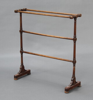 A Victorian turned mahogany towel rail raised on bun feet 84cm h x 79cm w x 29cm d 
