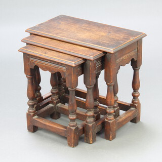 A nest of 3 17th Century style rectangular elm interfitting coffee tables raised on turned and block supports 45cm h x 49cm w x 28cm d, 42cm x 40cm x 25cm and 40cm x 31cm x 23cm 