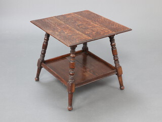 A Victorian square oak 2 tier occasional table, raised on turned supports, the top formed of 3 planks 58cm h  x 60cm w x 61cm d  
