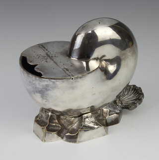 An Edwardian silver plated shell shaped spoon warmer on a rocky base 16cm  
