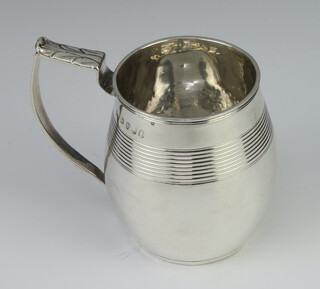 A George III silver baluster mug with ribbed decoration and acanthus handle, London 1778, 8cm, 118 grams 