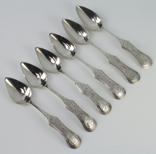 Six 19th Century silver coffee spoons with engraved decoration 64 grams 