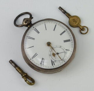 A Victorian silver cased keywind pocket watch London 1855 together with 2 keys, contained in a 47mm case (not working) 