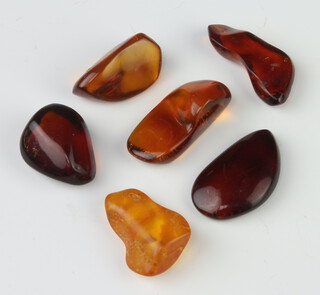 Six pieces of polished amber, 18 grams

