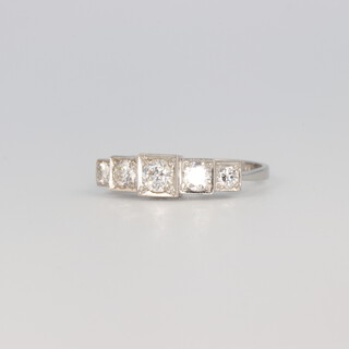 A platinum Art Deco style 5 stone graduated diamond ring 0.8ct, 3.6 grams, size N 1/2