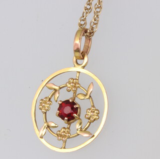 A 9ct yellow gold ruby pendant and chain 3.2 grams 
