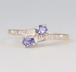 A 9ct yellow gold tanzanite and diamond ring 1.8 grams, size M 