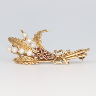 A 9ct yellow gold seed pearl and ruby floral spray brooch 4.4 grams, 45mm  