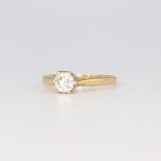 A yellow metal 18k single stone diamond ring, size K, 2.8 grams, approx. 0.5ct 