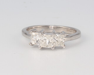 An 18ct white gold 3 stone princess cut diamond ring, size K, 3.5 grams, approx. 1ct, with certificate 