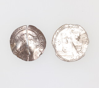 A Charles I shilling and an Elizabeth I sixpence 
