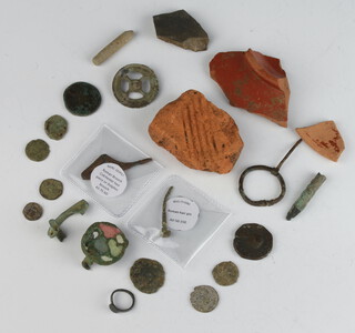 A collection of Roman coins and artefacts