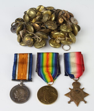 A World War One trio of medals to 5071 Pte.H.E.Field The Queens Regiment together with a collection of buttons and badges 