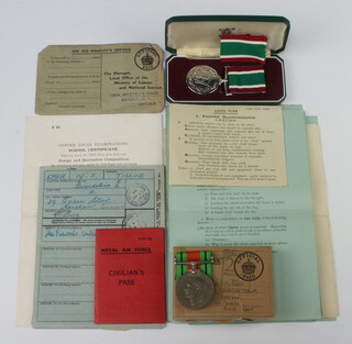 A Defence medal to F.C.Tilling in original posting box, minor ephemera including National Service grade card, permits, Homeguard paperwork etc together with a Woman's Voluntary Service medal, cased 
