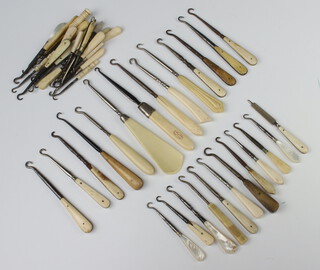 A collection of Victorian and later bone and mother of pearl handled implements 