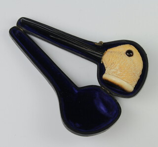 An Edwardian carved Meerschaum novelty pipe the bowl in the form of a ducks head with glass eyes and fitted case  