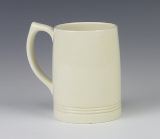 A Keith Murray Wedgwood white glaze mug with beaded decoration, tinted marks 13cm 