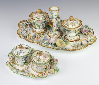 A 19th Century Coalbrook style inkstand with 2 lidded pots, profusely decorated with spring flowers 22cm, a larger ditto with 2 lidded pots and a candlestick profusely decorated with flowers 37cm 