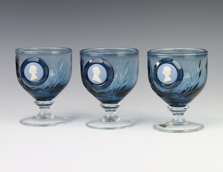 Two Wedgwood blue and white glass cameo goblets decorated with the bust of Queen Elizabeth II and one of Prince Philip , 13cm
