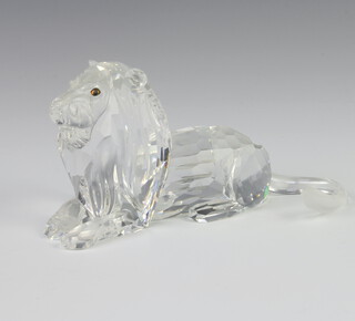 A Swarovski Collectors Society figure of a reclining lion 13cm boxed