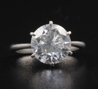 A fine white metal brilliant cut single stone diamond ring, approx. 3ct, in a 6 claw setting, clarity SI1/SI2 colour G/H, 4.1 grams 10mm diam. x 5mm deep (to be viewed by appointment only)  