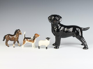 A Cooperware black gloss labrador 17cm, a brown gloss pony 10cm (stuck leg), a gloss beagle Wendover Billy 8cm and a gloss lamb 6cm (stuck leg)