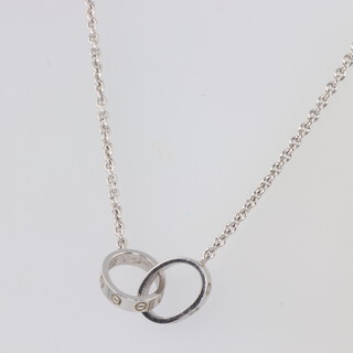 An 18ct white gold double pendant and ditto chain, 7.5 grams, chain is 40cm