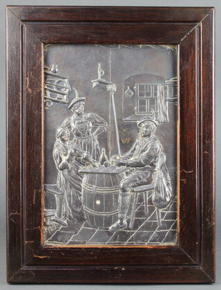 A rectangular embossed metal plaque depicting a tavern interior with figures, contained in a mahogany frame 36cm x 27cm 
