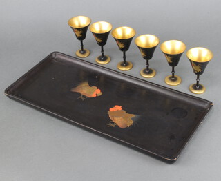 A 1930's rectangular Chinese lacquered cocktail set comprising tray decorated cockerels 43cm x 19cm and 6 goblets 10cm 