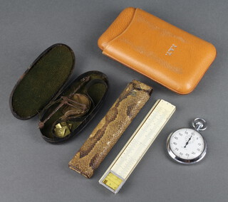 A set of 19th Century steel and brass gold weights together with 8 various weights, a slide rule in a snakeskin case, a stopwatch and a cigar case 