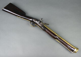 Vergnes, Marseilles, an 18th Century French canon barrelled blunderbuss with 38cm barrel engraved sunburst and with proof mark C, having a steel ramrod and walnut stock having "silver" forend and steel lock marked Vergnes A Marseilles 74cm overall 
