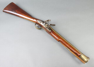 Bond of London, an 18th Century brass canon barrel Blunderbuss, the 40cm barrel with London proof mark, the steel lock marked Bond, complete with ram rod, walnut stock and nail fitted butt plate 80cm overall 