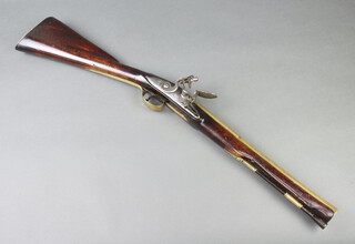 Barber of London, an 18th Century brass barrelled flintlock blunderbuss, the 38cm barrel marked London and with Tower proof marks, the steel lock marked Barber, complete with original ram rod and walnut stock 77cm overall  