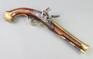 Waters and Gill, a late 18th Century brass barrelled flintlock pistol, the 20cm brass barrel marked London and with London proof mark, the steel lock marked Water Gill, the underside of the walnut stock marked JS, having a brass trigger guard with rose and acorn decoration, the brass butt cap decorated a grotesque and marked 2, complete with ram rod, 36cm overall 
