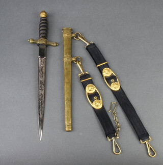 A German style Naval dirk, the 25cm blade with Hoster trademark in a gilt scabbard with replacement pommel & grip and later gilt and black cloth hangers 