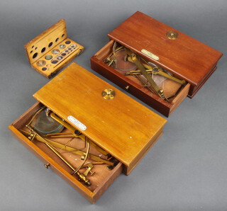 A D'egrave.Short & Company Ltd., two pairs of brass and mahogany Class B gold scales to weigh 2oz. together with a boxed set of weights