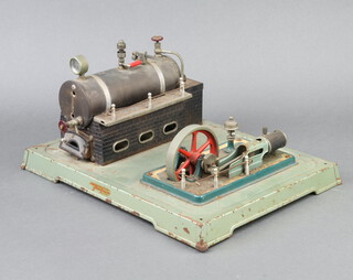Heischmann, a stationary steam engine with metal base 17cm h x 34cm w x 25cm d 