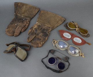 A pair of 1920's leather mitten gauntlets together with 5 pairs of goggles 