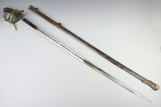 A Victorian Infantry Officer's sword with 89cm blade etched the Royal Cypher with gilt and chromed scabbard (rusty in places) 