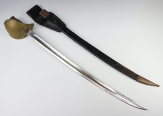 An American 1860 Naval cutlass, the 66cm blade marked USN DR. 1862 complete with leather scabbard 