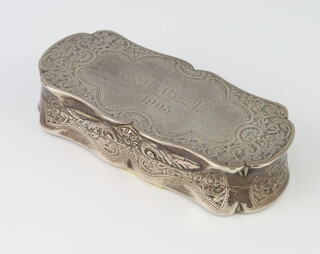 An Edwardian silver rounded rectangular snuff box engraved with a monogram and date 1908, Chester 1902, 84 grams, 8cm 