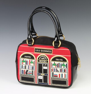 Lulu Guinness, a canvas "The Book Club" handbag with carrying handles and leather shoulder strap, complete with dust cover, 20cm h x 26cm w x 10cm d