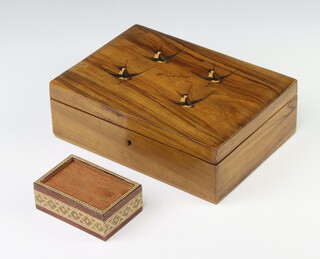 A small Tunbridge Ware box with sliding lid the sides with decorated panels 3cm x 9cm x 5cm, an olive wood box with hinged lid decorated swallows Bellagio 7cm x 21cm x 16cm (splits to the top and slightly warped) 