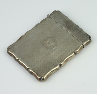 A silver engine turned card case with engraved monogram Birmingham 1899, 60 grams
