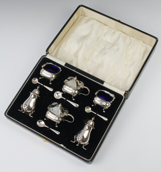 A George VI silver six piece condiment with spoons Birmingham 1937, 200 grams, cased 
