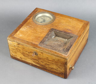 A Blick time recorder with 10cm circular silvered dial and Arabic numerals contained in an oak case 15cm x 34cm x 31cm, marked Stafsine 